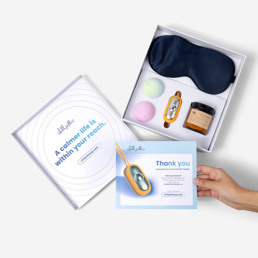 Detailed view of The Chill Pill and its gift box contents including a thank you card.